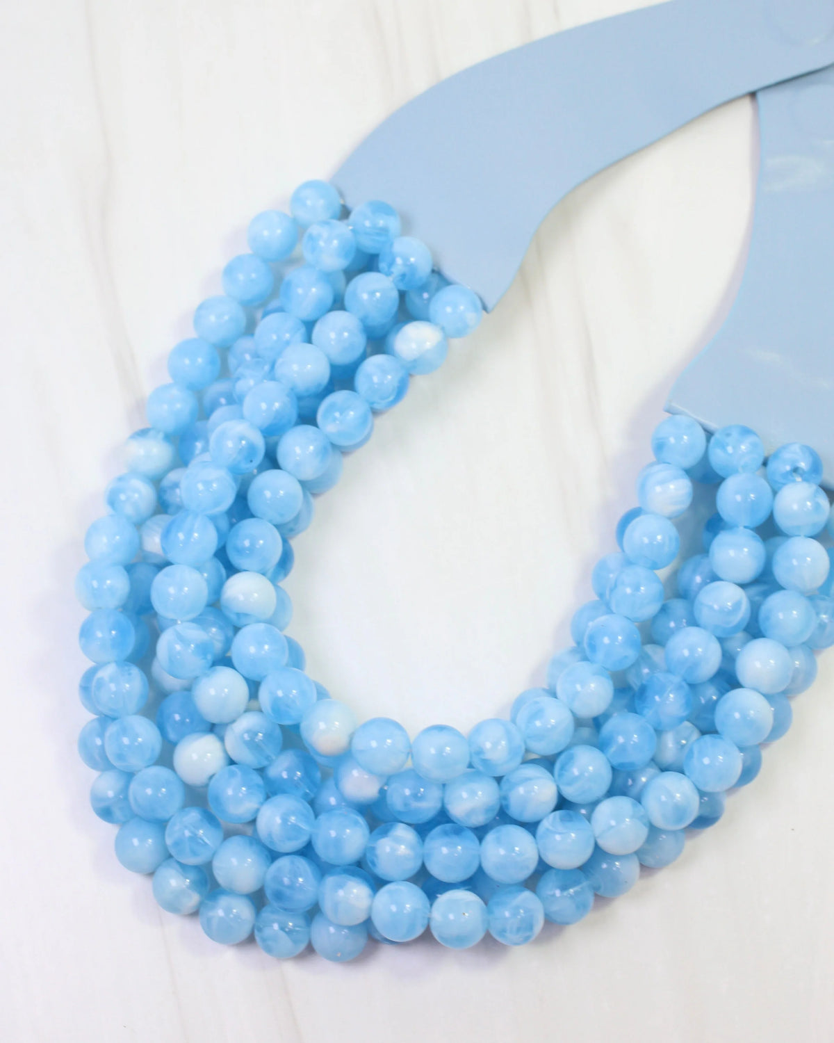 Kimbrel Multi Layered Smooth Beaded Necklace Light Blue